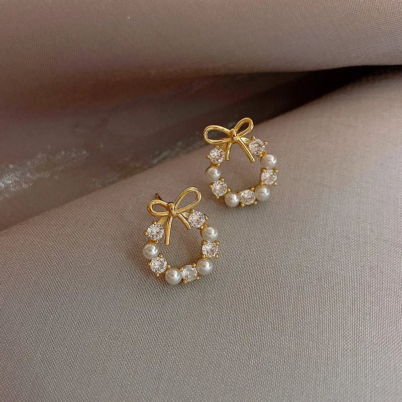 Bow Knot Pearl Stud Earrings — Rhinestone Accent