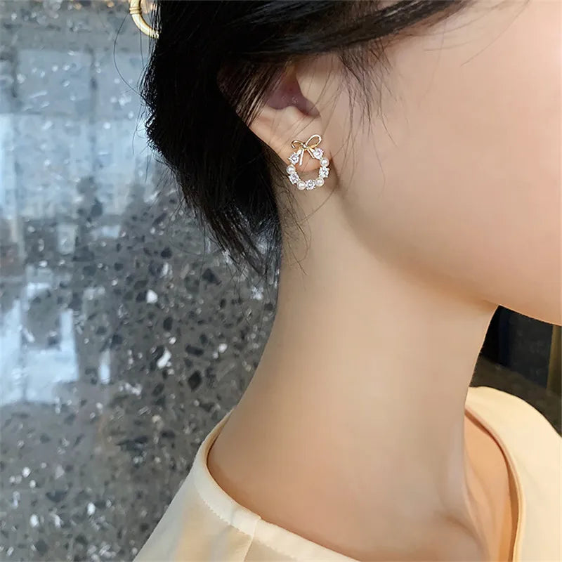 Bow Knot Pearl Stud Earrings — Rhinestone Accent