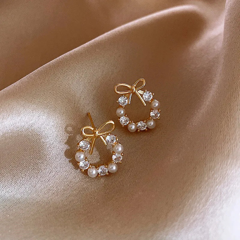Bow Knot Pearl Stud Earrings — Rhinestone Accent