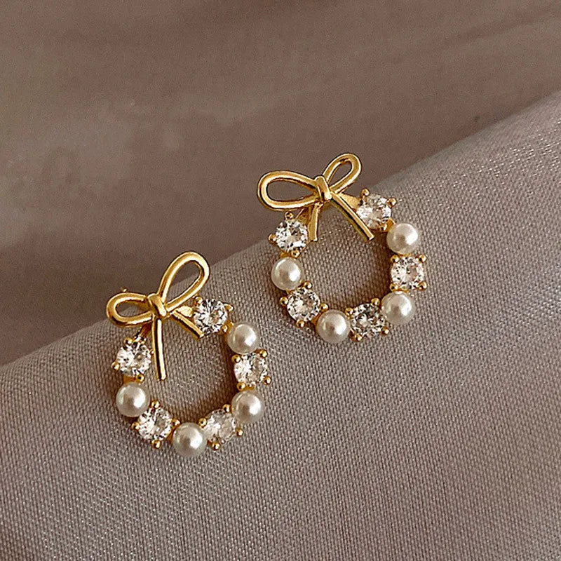 Bow Knot Pearl Stud Earrings — Rhinestone Accent